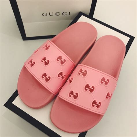 women's pink Gucci slides